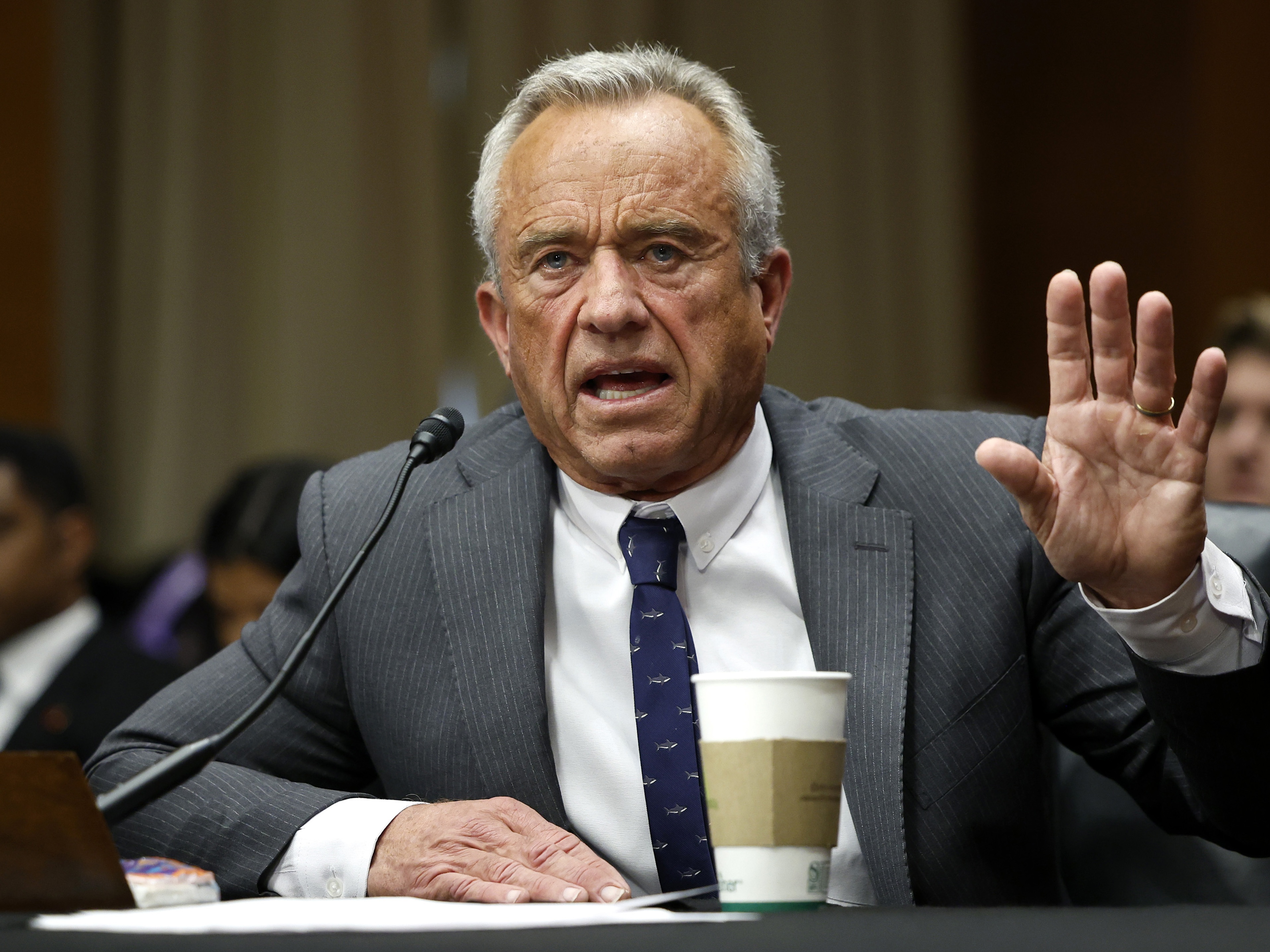 caption: As Secretary of Health and Human Services, Robert F. Kennedy Jr. has sweeping authority over the country's immunization policies. During confirmation hearings, he clashed with Senate Democrats over his stance on vaccines.