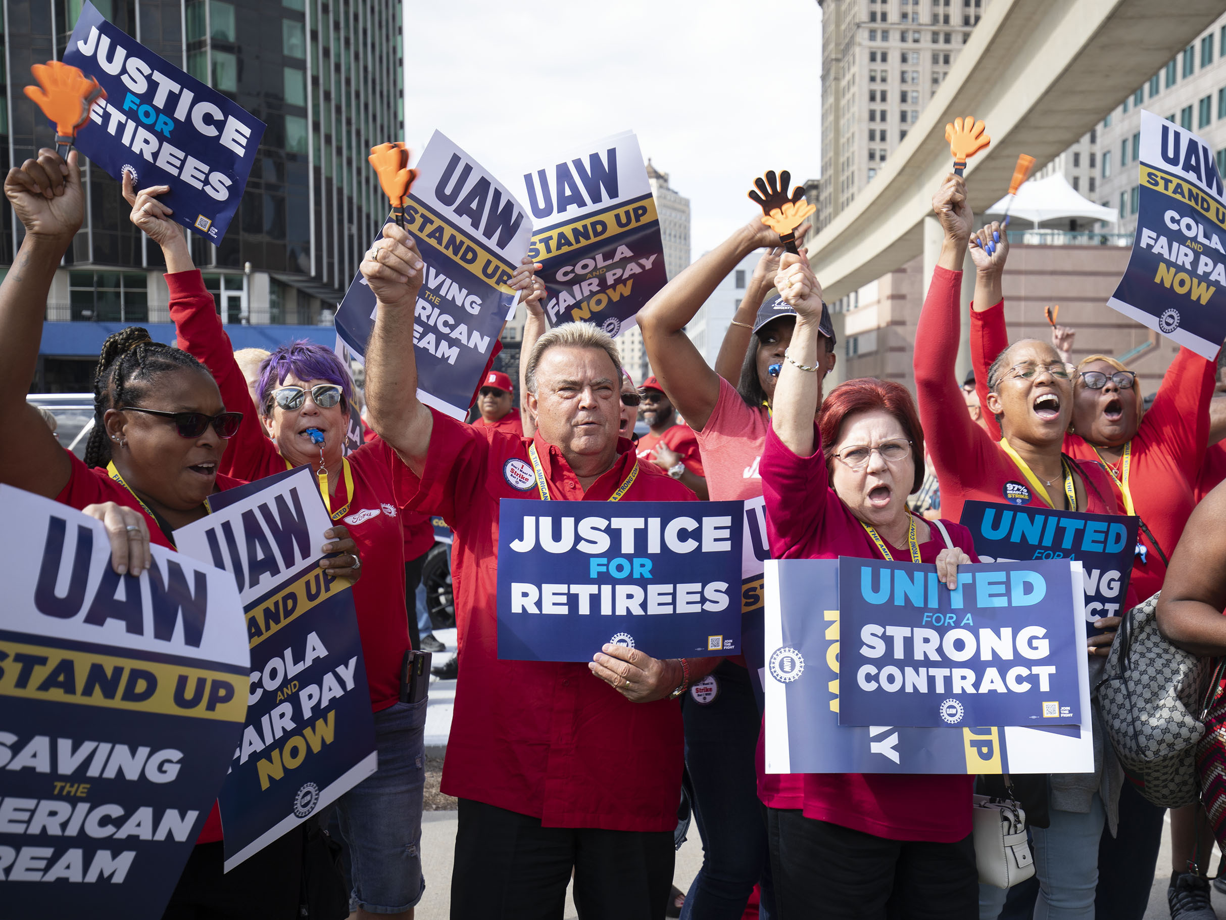 caption: UAW members attend a solidarity rally as the UAW strikes the Big Three automakers on September 15, 2023 in Detroit. GM announced temporary layoffs on Wednsday, blaming the strikes.