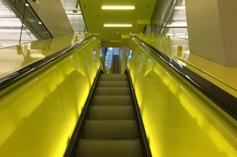 caption: An escalator inside the Seattle Public Library in downtown Seattle