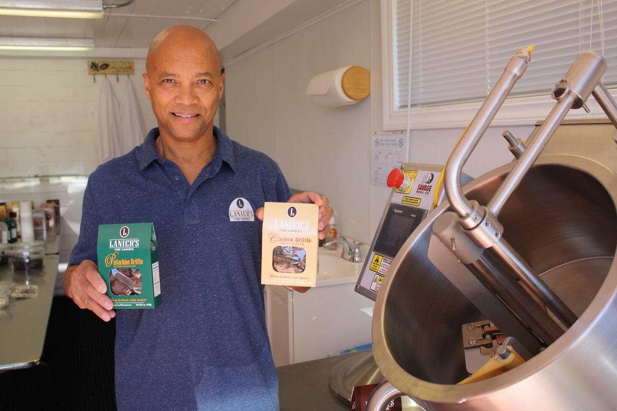 caption: Herman Lanier has spent a lot of money turning his Beacon Hill basement into a commercial kitchen so he can crank out nut brittles on a larger scale. He's very interested in faster Internet service, but will be watching the cost closely.