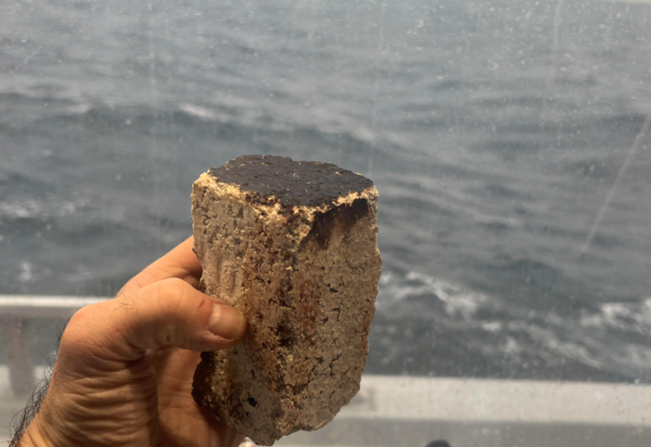 caption: A brick from the site of the wreck. This was later turned over to the U.S. government as part of the official salvage request. 