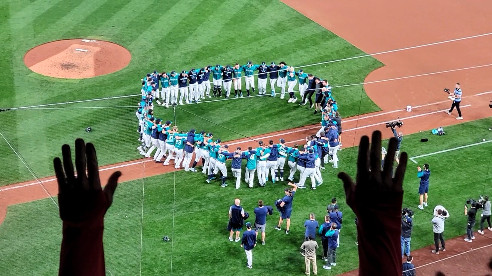 KUOW - Mariners fans celebrate a walk-off to the playoffs after