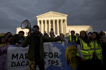 caption: Demonstrators arrive in front of the U.S. Supreme Court during a march in support of Deferred Action for Childhood Arrivals (DACA) on Nov. 10.