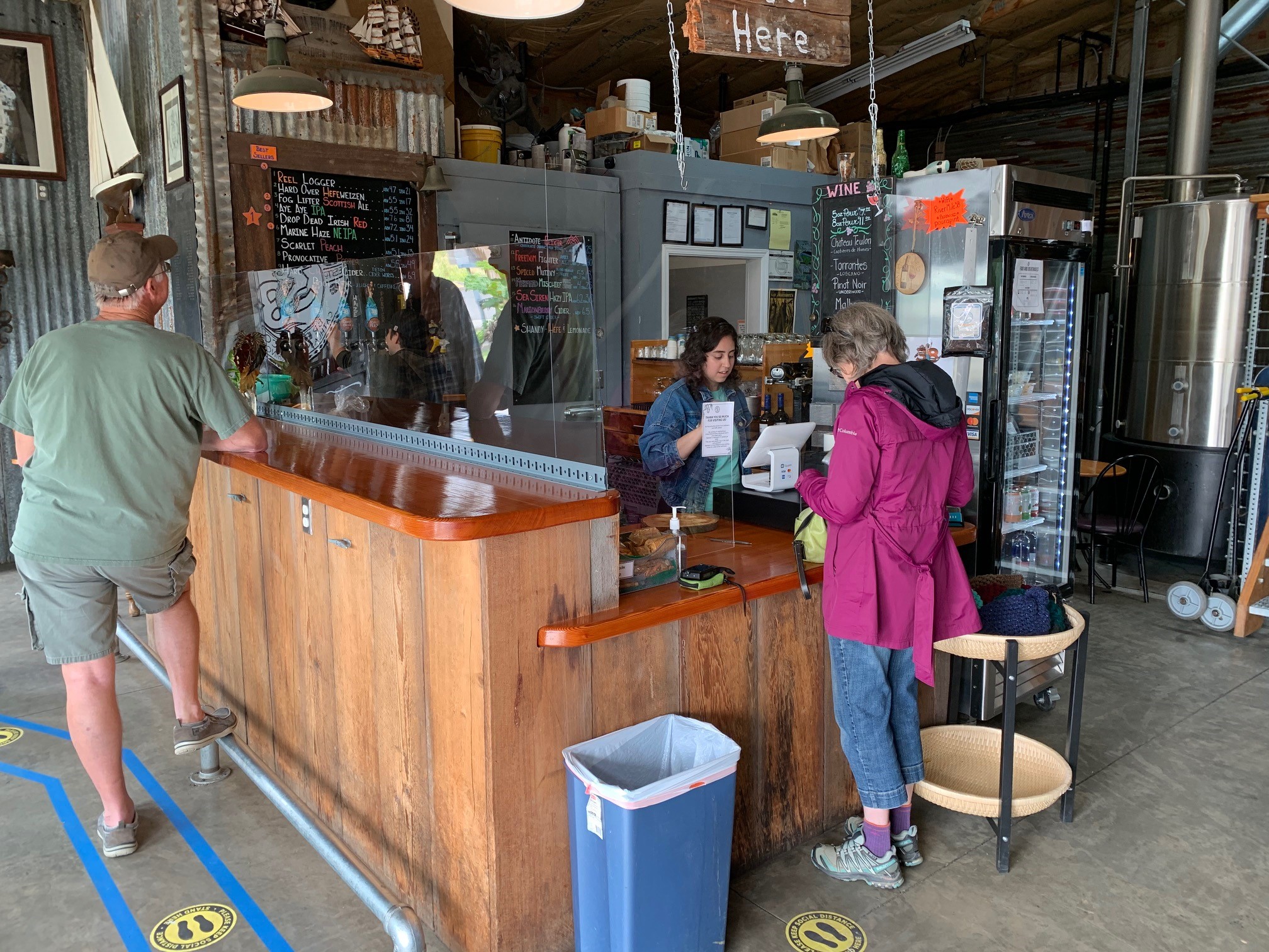caption: Customers flocked to the River Mile 38 brewpub in Cathlamet after it reopened its tasting room and patio in mid-May. Wahkiakum County is in the vanguard of Washington counties advancing through Safe Start reopening phases.