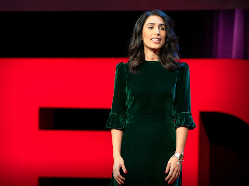 caption: Yasmin Green on the TED stage.