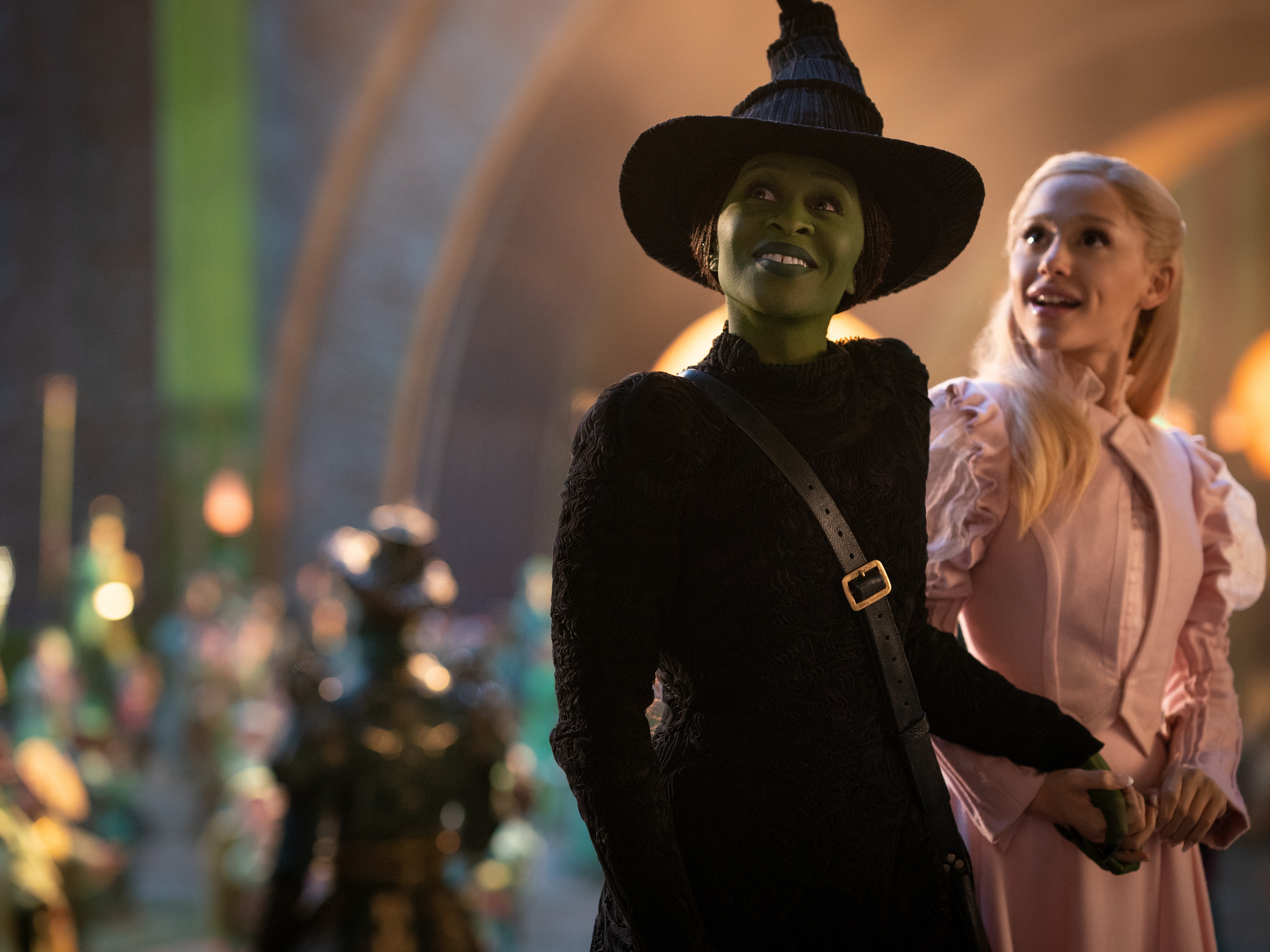 caption: Cynthia Erivo and Ariana Grande in <em>Wicked</em>.