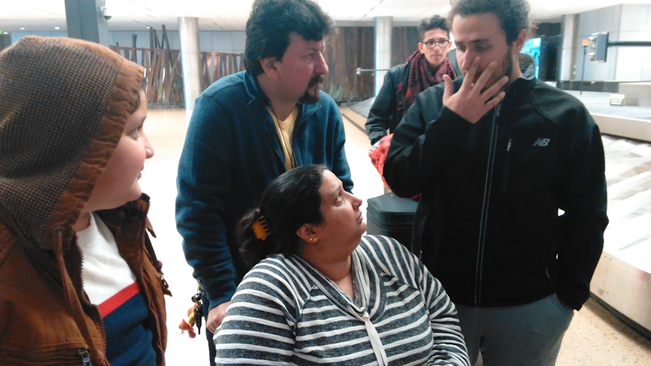 caption: From left, Haider Kadhem, Sarmd Hady, Wafaa Fakhri and Mustafa Kadhem. Fakhri had gone to visit her sister, who is ill, in Iraq. She worried she wouldn't be allowed back in to the U.S., even though she is a green card holder.