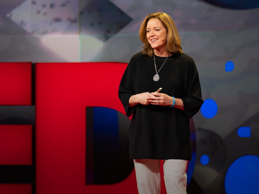 caption: Katie Hood on the TED stage.