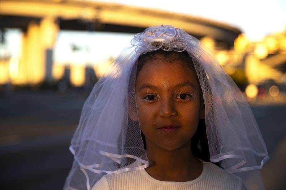 caption: Rosalia Valderrama, 8, poses for a portrait before attending Beyonce’s Seattle stop on the Renaissance World Tour with her parents, on Thursday, Sept. 14, 2023, near Lumen Field in Seattle. 