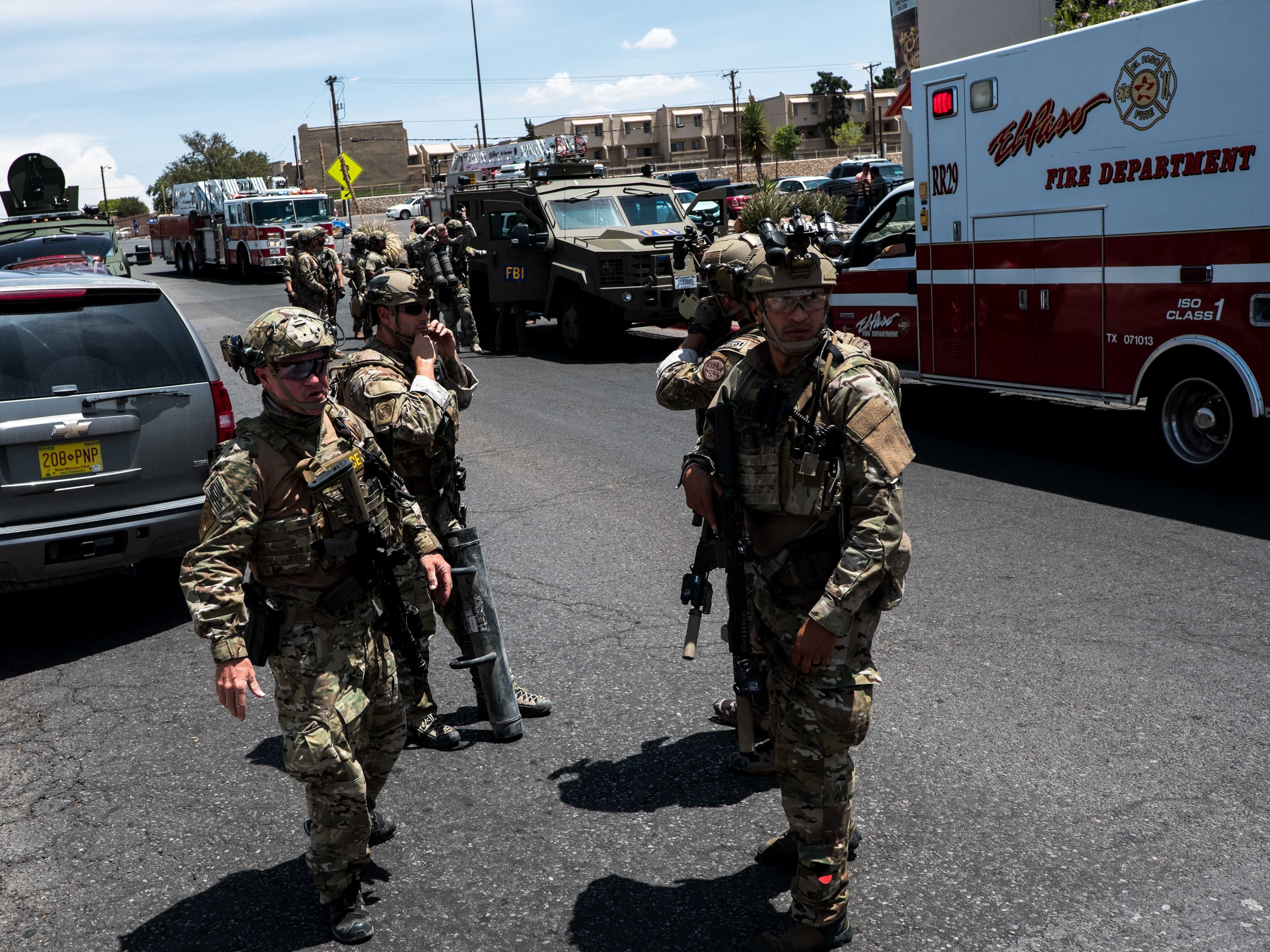 caption: Law enforcement agencies respond to an active shooter at a Walmart near the Cielo Vista Mall in El Paso, Texas, on Saturday.