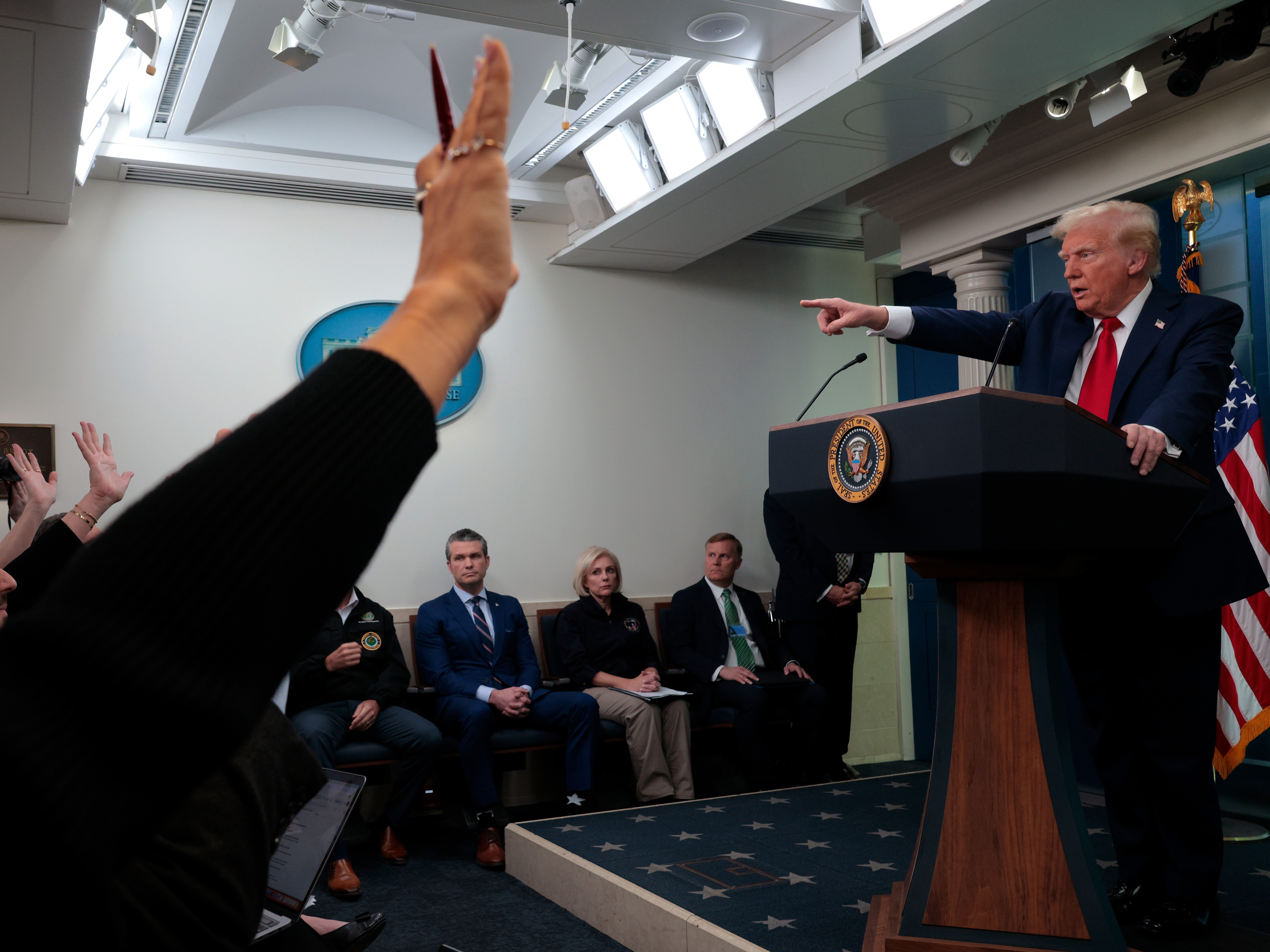 caption: President Trump takes questions from reporters at the White House on Thursday about the collision of an American Airlines flight with a military Black Hawk helicopter near Ronald Reagan Washington National Airport.