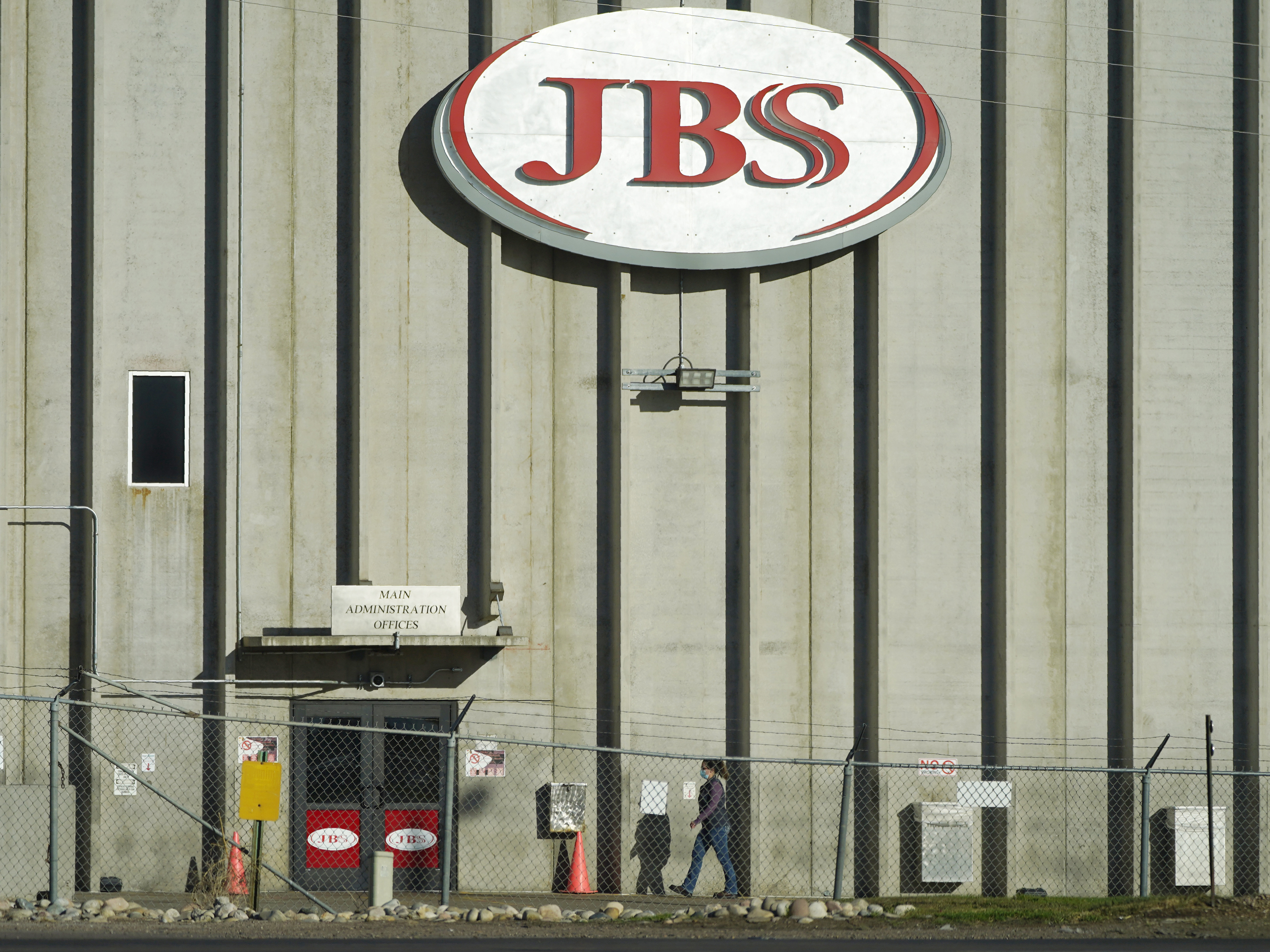 caption: A weekend ransomware attack on the world's largest meat company disrupted production around the world just weeks after a similar incident shut down a U.S. oil pipeline.