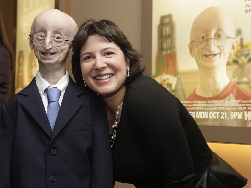 caption: Sam Berns and Audrey Gordon, executive director of The Progeria Research Foundation and Berns's aunt, attend The New York Premiere Of HBO's "Life According To Sam" on October 8, 2013 in New York City.
