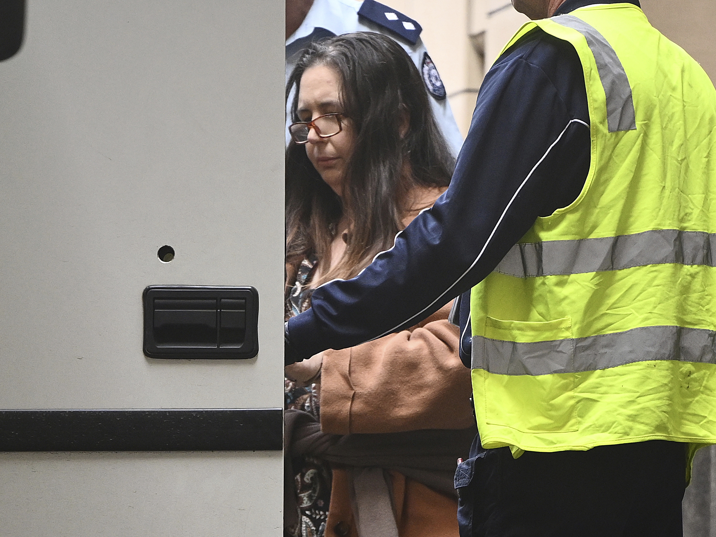 caption: Convicted triple murderer Erin Patterson leaves the Supreme Court of Victoria following her sentencing in Melbourne, Australia, on Monday, Sept. 8, 2025.