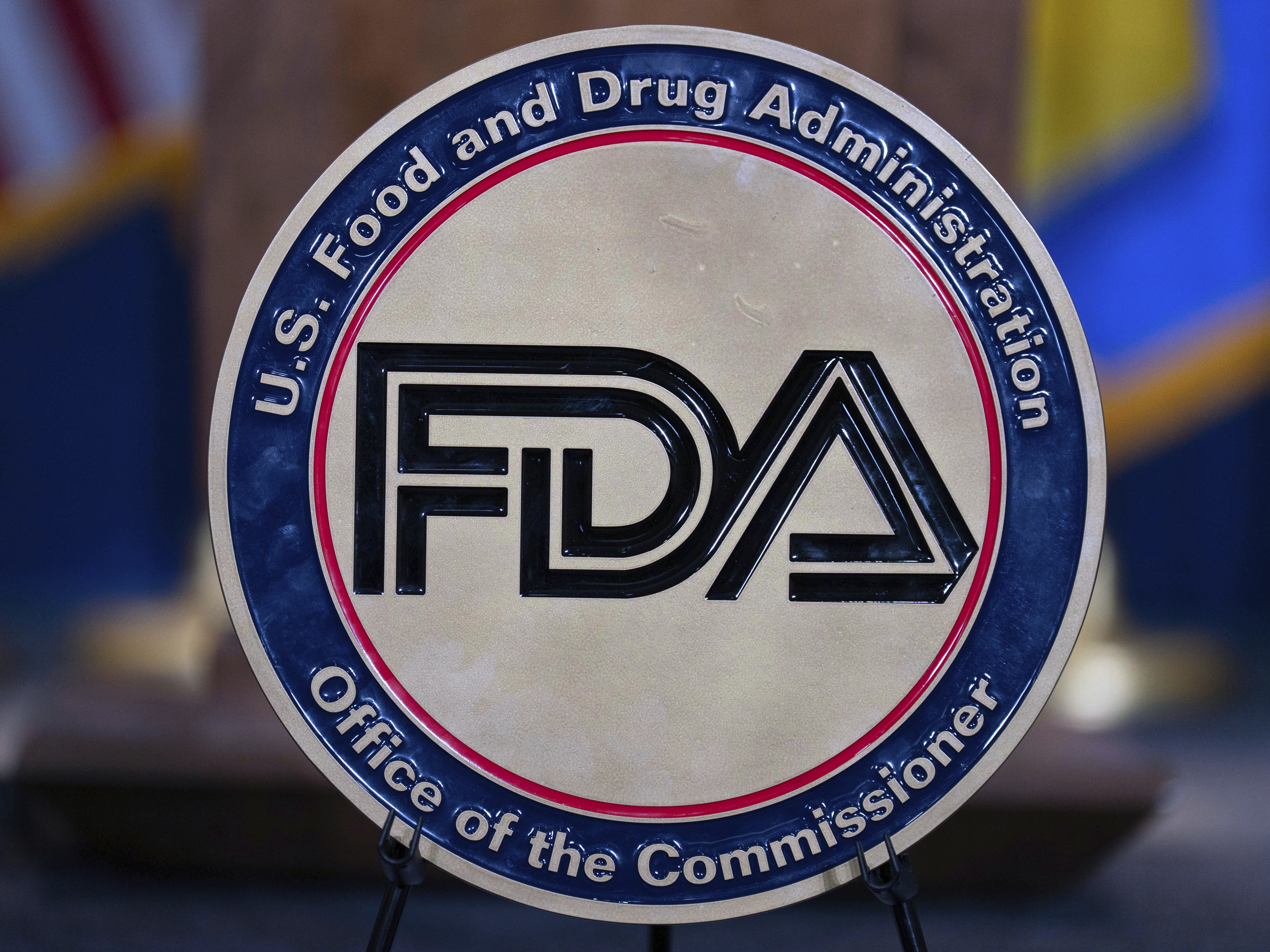 caption: The Food and Drug Administration seal is seen at the Hubert Humphrey Building Auditorium in Washington, D.C., on April 22, 2025.