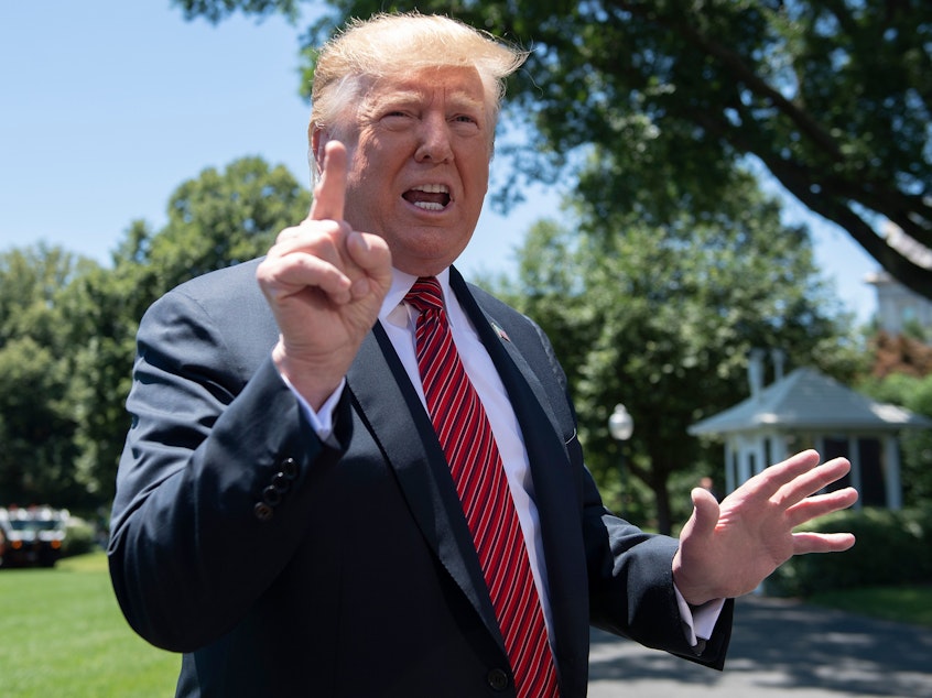 caption: President Trump speaks with reporters at the White House on June 11. He told ABC News that he would be open to hearing information about rival presidential candidates from a foreign government.