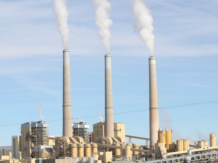 caption: The Hunter power plant in Utah generates electricity by burning coal. Coal combustion releases enormous amounts of carbon into the atmosphere. The Utah plant is scheduled to keep operating until 2042.