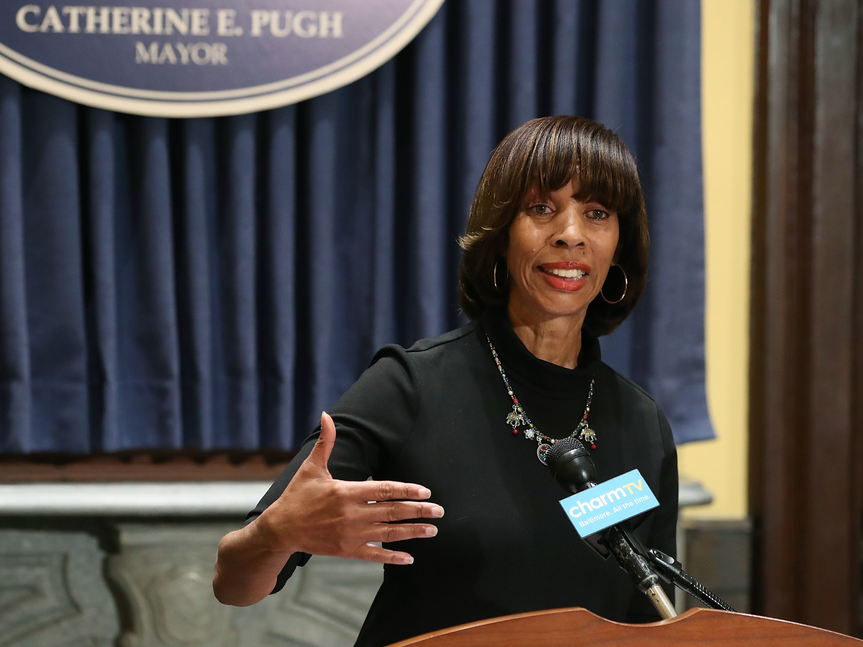 caption: Baltimore Mayor Catherine Pugh, under investigation in connection with lucrative sales of her children's book, was the subject of a federal raid Thursday morning.
