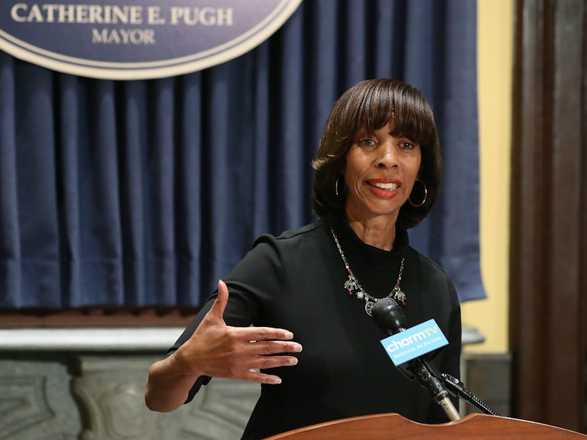 caption: Baltimore Mayor Catherine Pugh, under investigation in connection with lucrative sales of her children's book, was the subject of a federal raid Thursday morning.