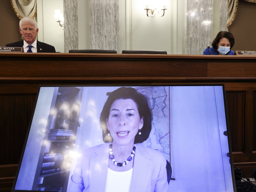 caption: Rhode Island Gov. Gina Raimondo appears through video conferencing Tuesday during a Senate hearing for her nomination as the secretary for the Commerce Department, which oversees the U.S. Census Bureau.