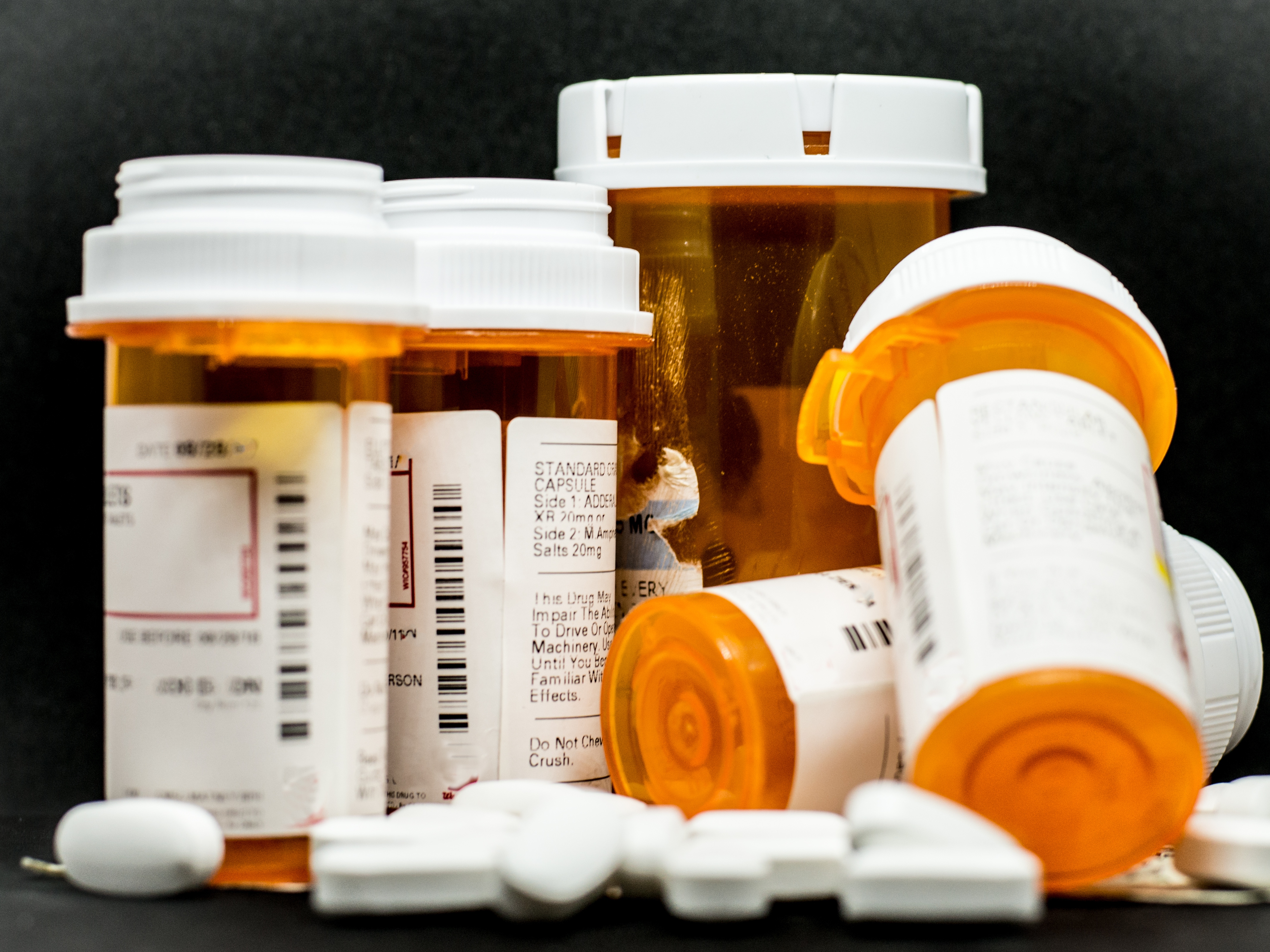 caption: Health insurers' lists of covered drugs have gotten tighter.