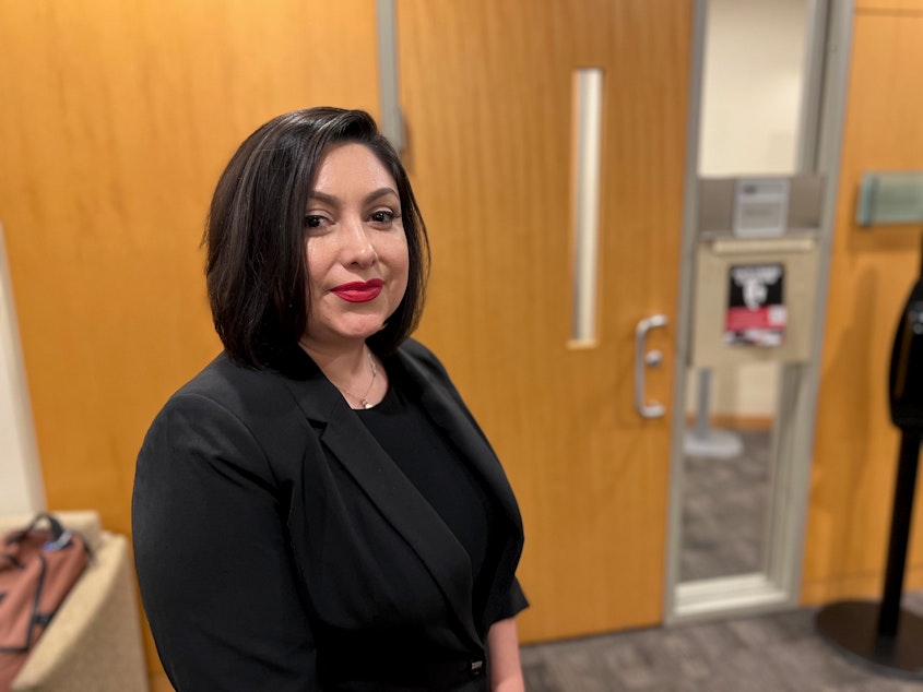caption: Yessenia Manzo, a prosecuting attorney for King County, spoke at a community forum at Seattle University about anti-Asian hate crimes on Wednesday, Nov. 29, 2023.