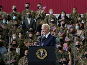 caption: President Biden speaks to U.S. service members in England, on the first stop of his first overseas trip as president.