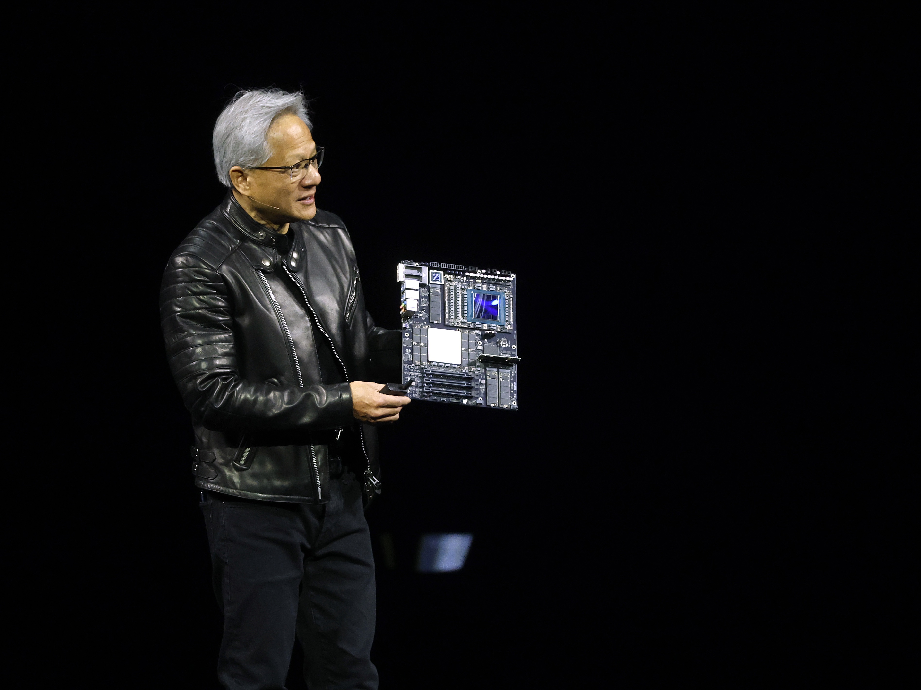 caption: Nvidia CEO Jensen Huang delivers the keynote address at the annual Nvidia GTC conference in San Jose, Calif. last month.