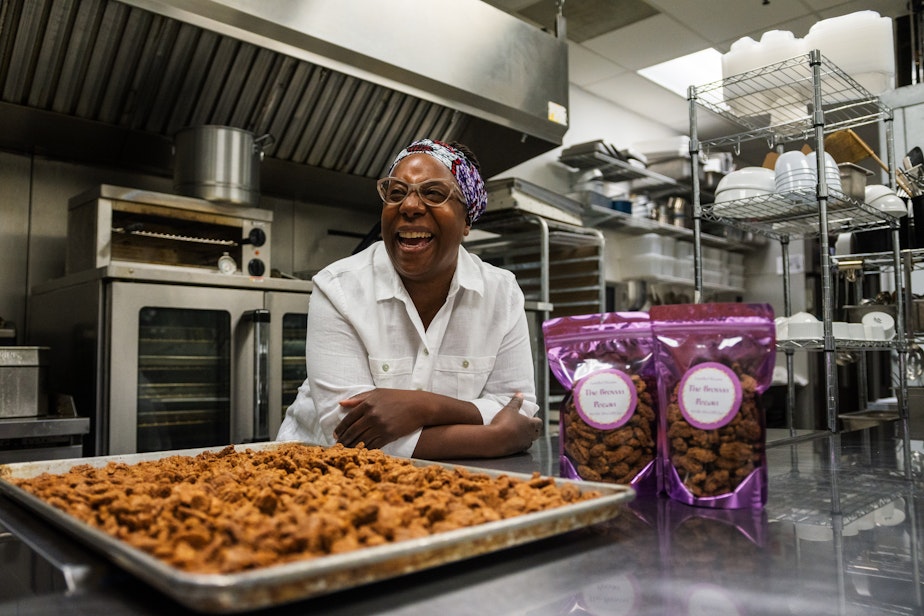 caption: MariChris Brown pictured next to her candied pecans in Tukwila.