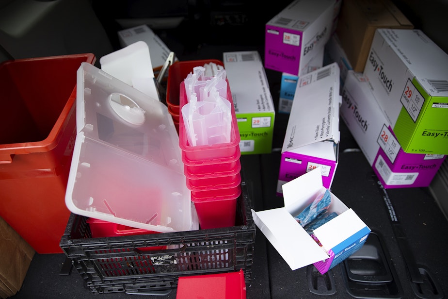 caption: Harm reduction supplies are shown in the back of a Sound Pathways Syringe Services Program vehicle as outreach workers deliver supplies to individuals at their homes on Tuesday, July 25, 2023, outside of Granite Falls. 