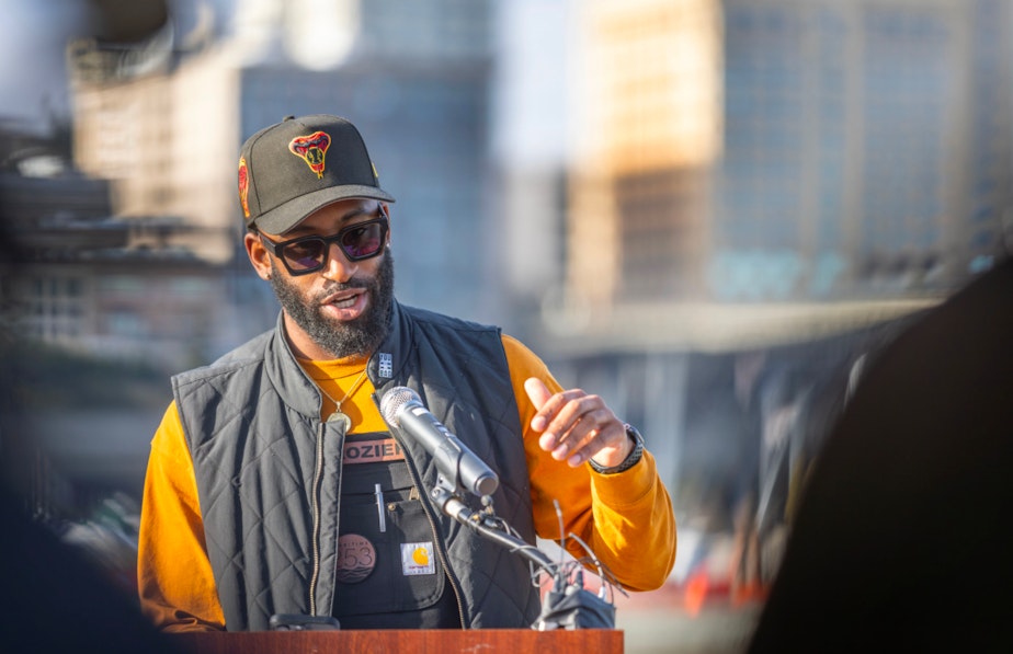 caption: Tacoma School Board President Korey Strozier talked to KUOW's Angela King about his call to community members to "dig in".