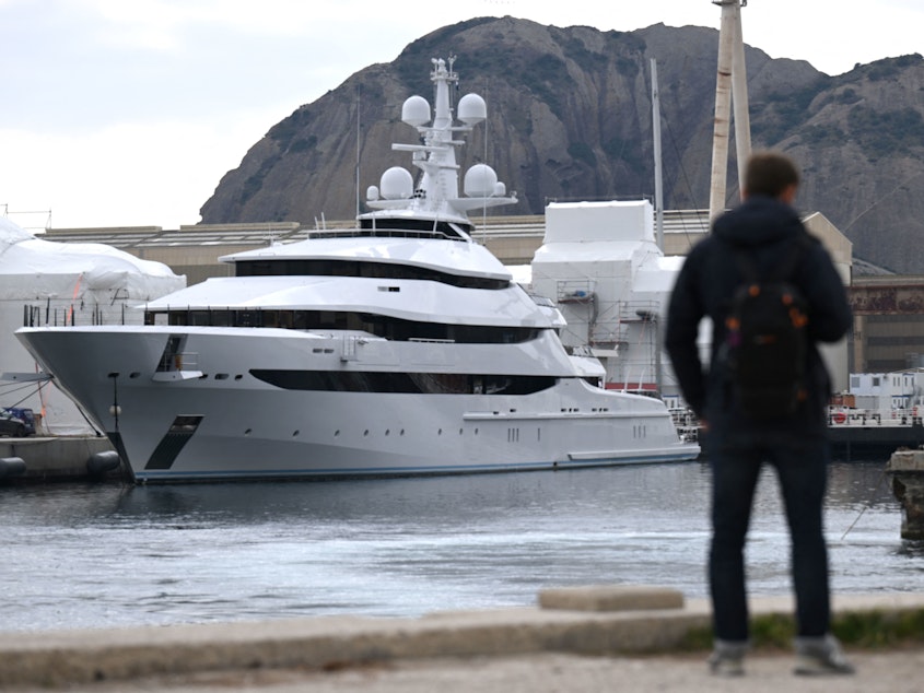 caption: Amore Vero, the yacht owned by a company linked to Igor Sechin, is pictured in the shipyard of La Ciotat in southern France on Thursday.