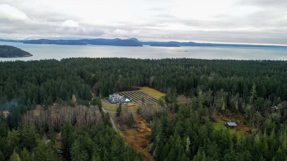 caption: Orcas Power & Light Cooperative solar/battery plant, built in 2018 on Decatur Island, one of the smaller San Juan Islands, shown in February 2021.