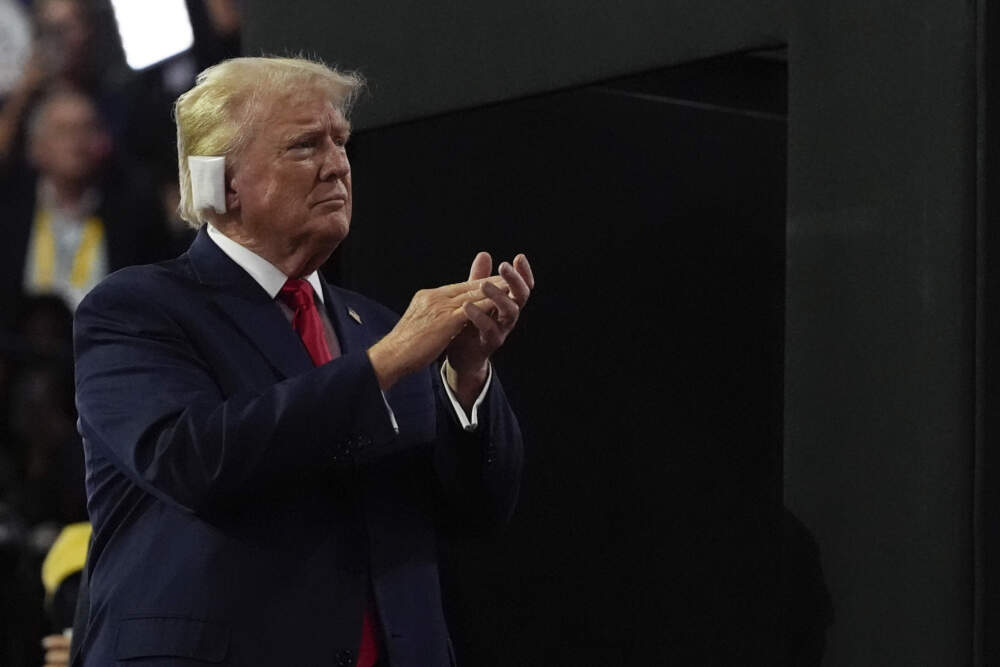 caption: Republican presidential candidate former President Donald Trump appears during the Republican National Convention in Milwaukee. (Julia Nikhinson/AP)