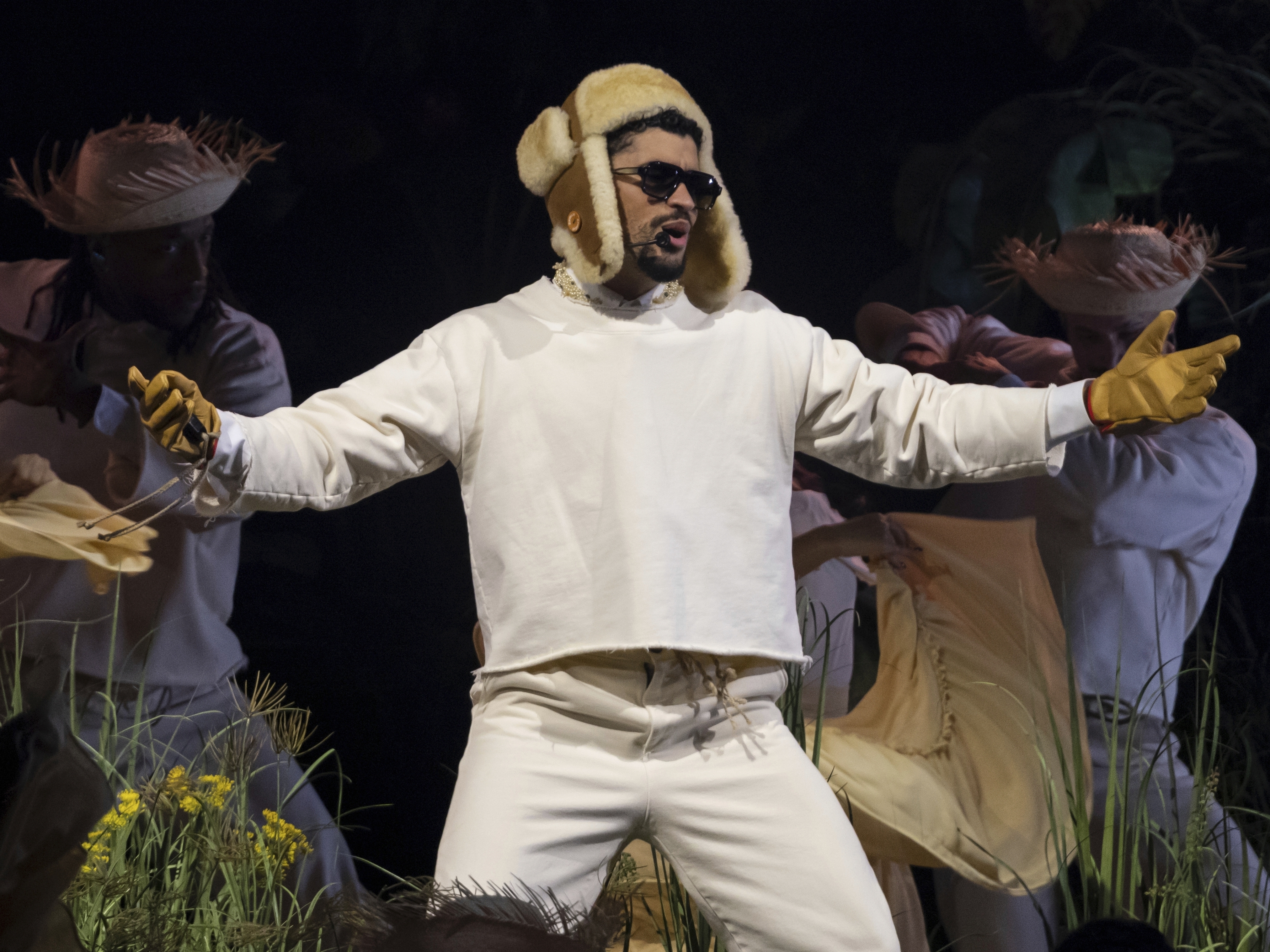 caption: Bad Bunny performs during the final concert of his summer residency in his homeland at the Coliseo de Puerto Rico Jose Miguel Agrelot, in San Juan, Puerto Rico, Saturday, Sept. 20, 2025.