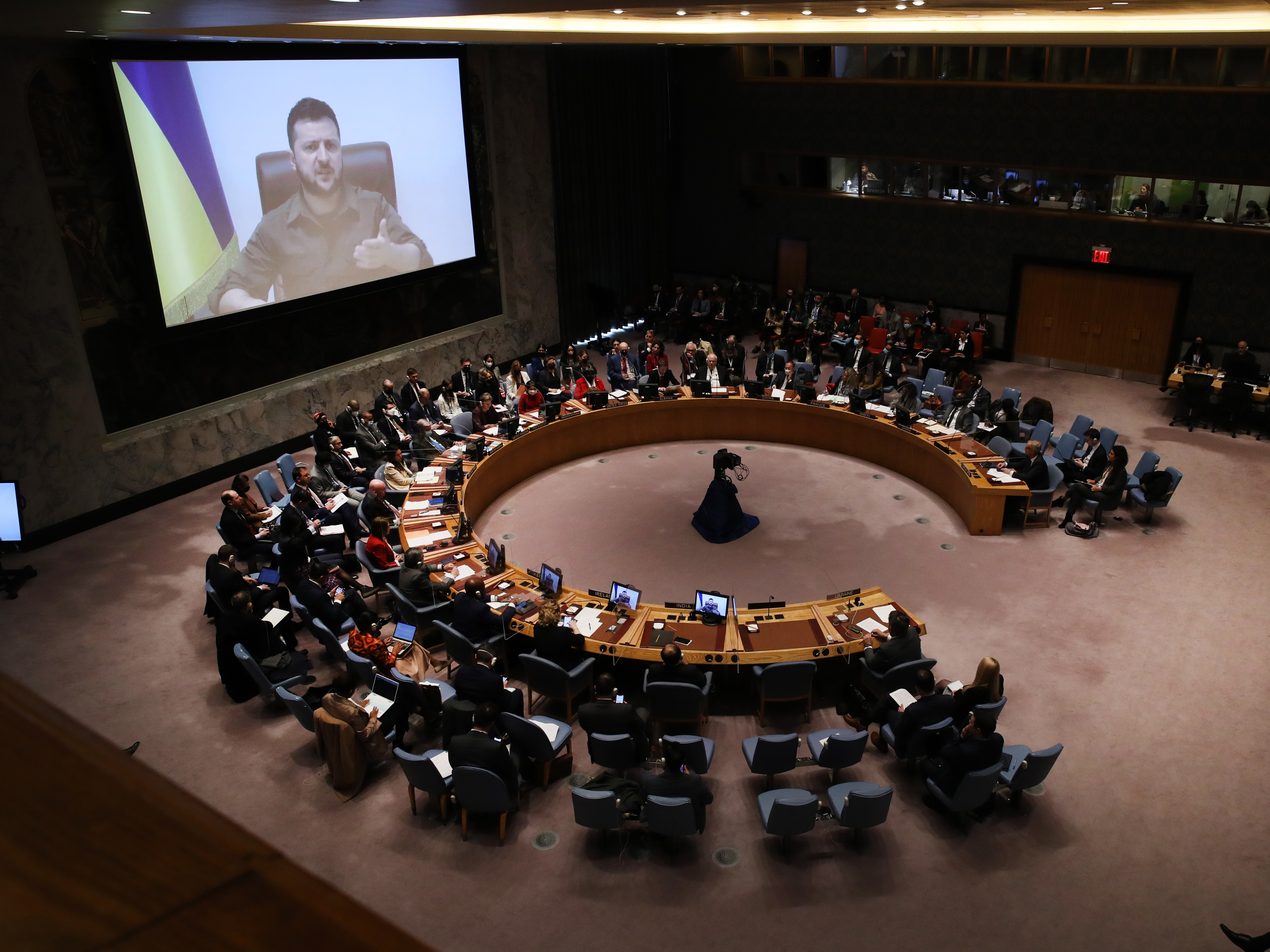 caption: Ukrainian President Volodymyr Zelenskyy addresses the United Nations Security Council via video link on Tuesday in New York City.