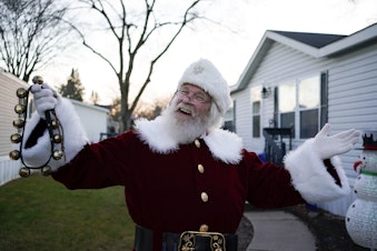 caption: Santa entertainer Randyl Wagner in front of his home in Rochester Hills, Michigan.