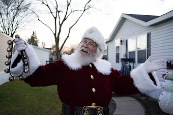 caption: Santa entertainer Randyl Wagner in front of his home in Rochester Hills, Michigan.