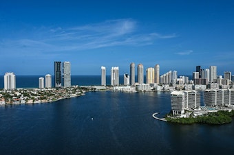 caption: Driven by new regulations, developers are tearing down many older buildings on the waterfront in Miami and other cities in Florida and replacing them with luxury condominiums.