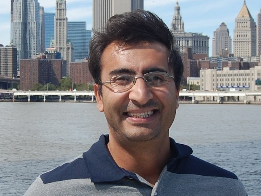 caption: Zalmai Yawar is a PhD candidate in Geology at Indiana University. He was Scott Simon's translator during a reporting trip in Afghanistan in 2002.