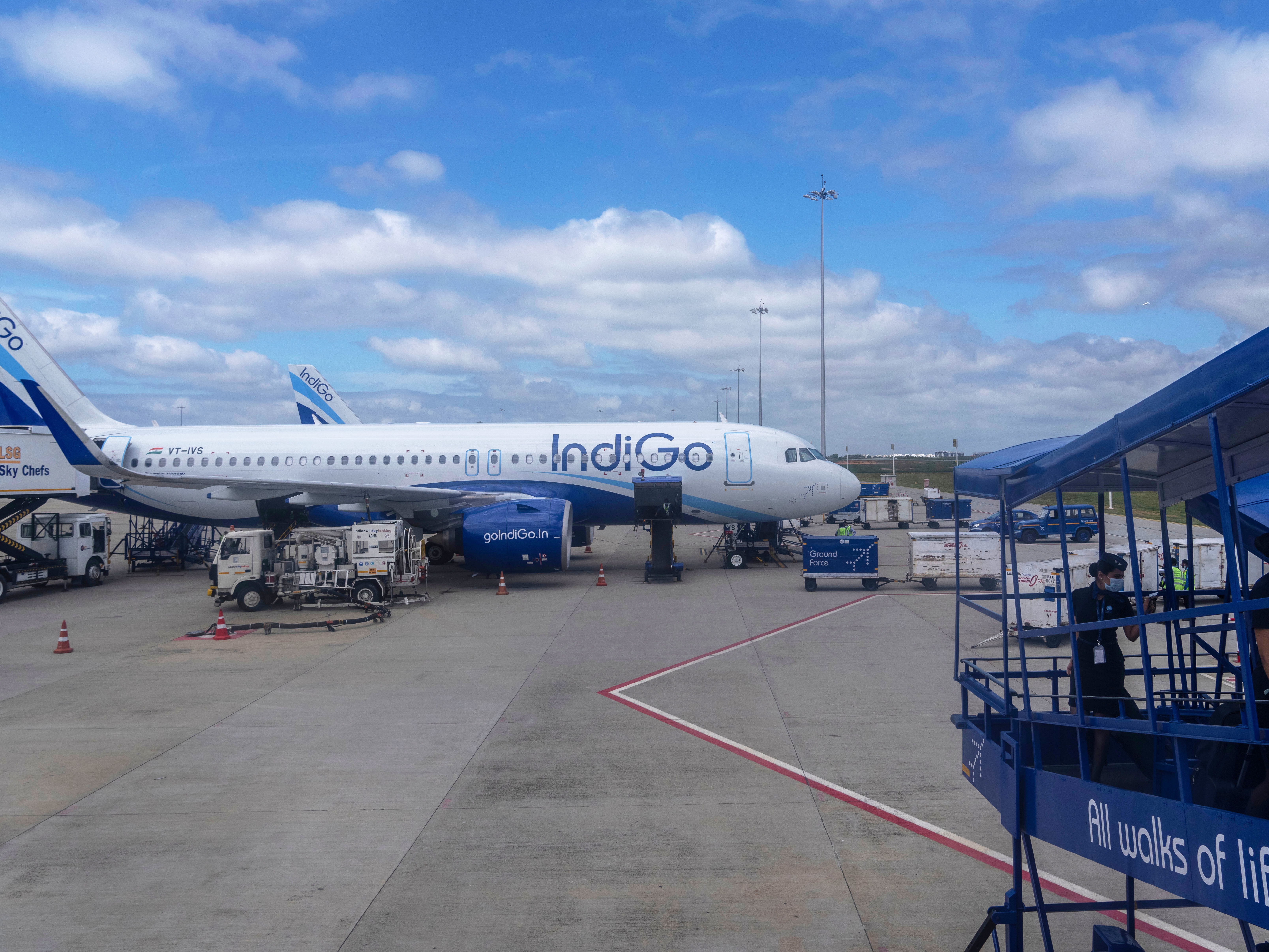 caption: FILE - An aircraft of India's budget airline IndiGo is serviced at Kempegowda International Airport in Bangalore, India, Sept. 16, 2022.