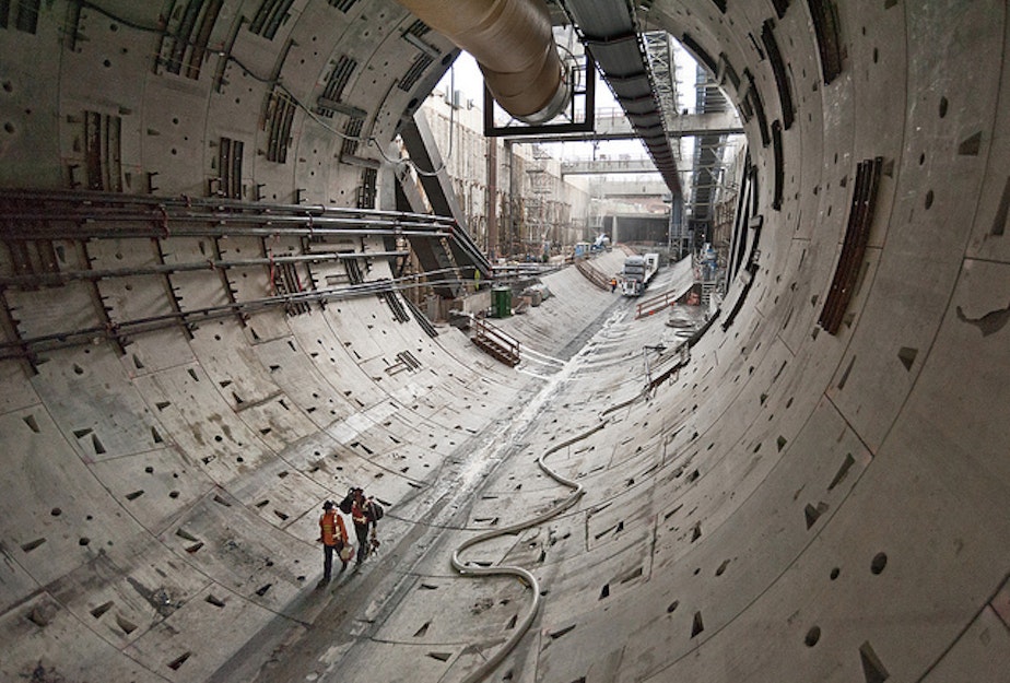 caption: Digging for the Highway 99 tunnel has been halted since Bertha, the digging machine, hit an unknown impediment on Friday. Pictured here is the wake of the giant machine as it burrows under Seattle.