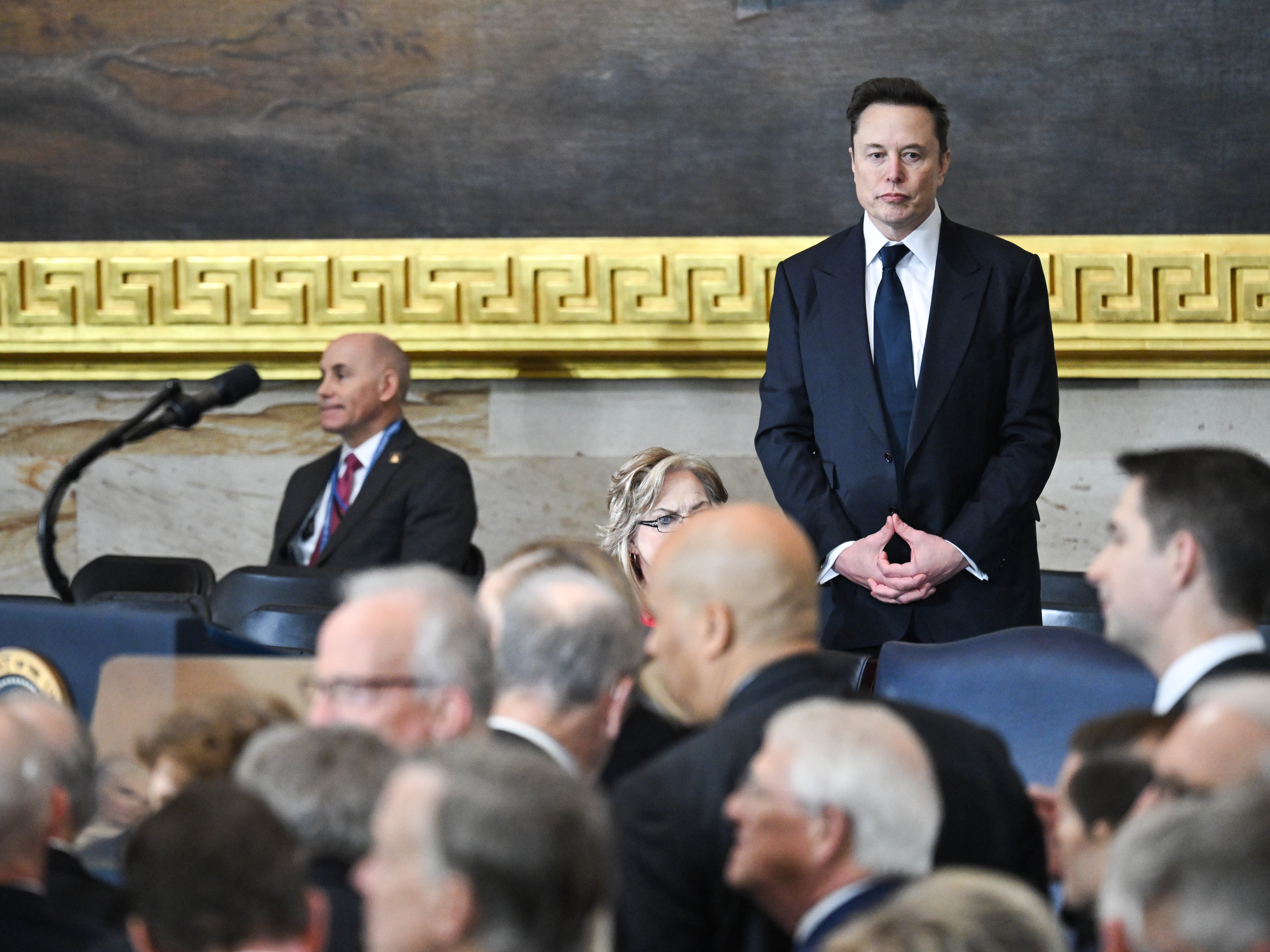 caption: Elon Musk at the inauguration of President Trump on Jan. 20, 2025 in Washington, DC. Trump tasked Musk with dramatically slashing government via the Department of Government Efficiency team. It's work has been secretive and controversial and has created chaos throughout the federal workforce.