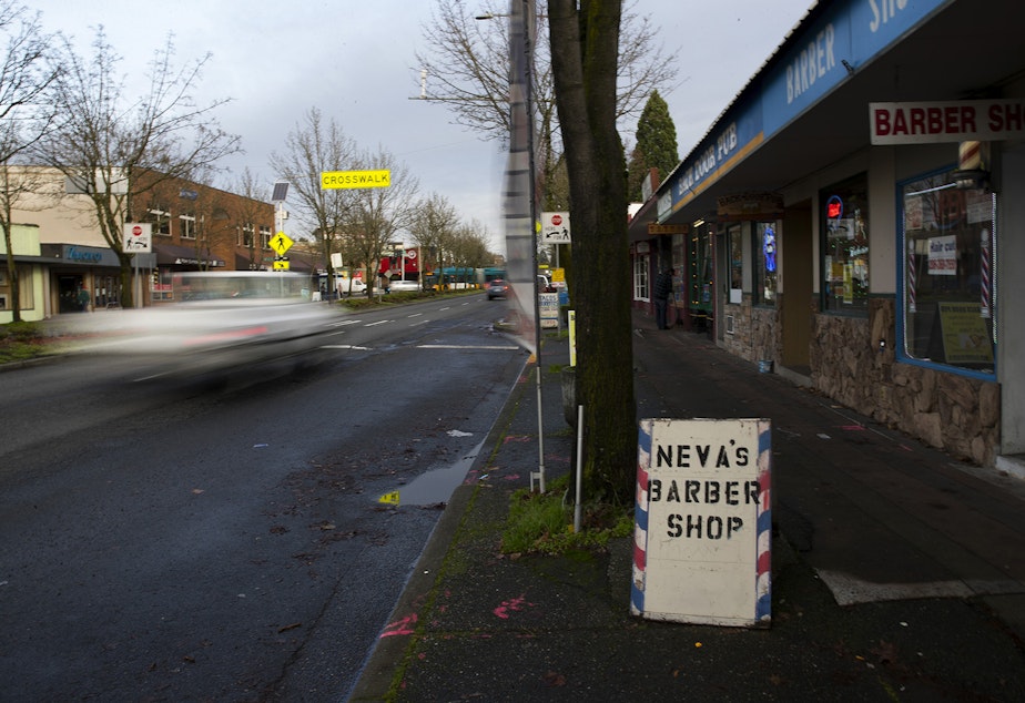 caption: Cars are shown traveling north on Lake City Way Northeast on Monday, December 17, 2018 in Seattle.