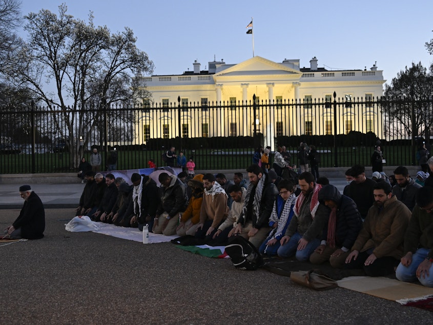 caption: Muslims gather to hold a demonstration to demand ceasefire for Gaza in front of the White House on the first day of the holy month of Ramadan on March 11.