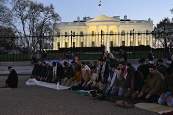 caption: Muslims gather to hold a demonstration to demand ceasefire for Gaza in front of the White House on the first day of the holy month of Ramadan on March 11.