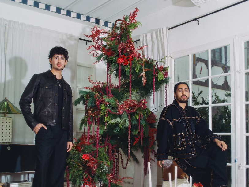 caption: Marco Zamora, a 27 year-old interior decorator/design DIY-er, and Juan "El Creativo" Renteria, a 26 year-old floral artist, initially met over Instagram. The floral floating tree in Zamora's apartment is their first collaboration together.