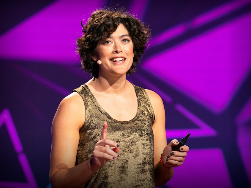 caption: Molly Webster speaks from the TED stage at TED@NAS, a 2019 TED-curated event, organzied in partnership with The Kavli Foundation, the Simons Foundation and the National Academy of Sciences.