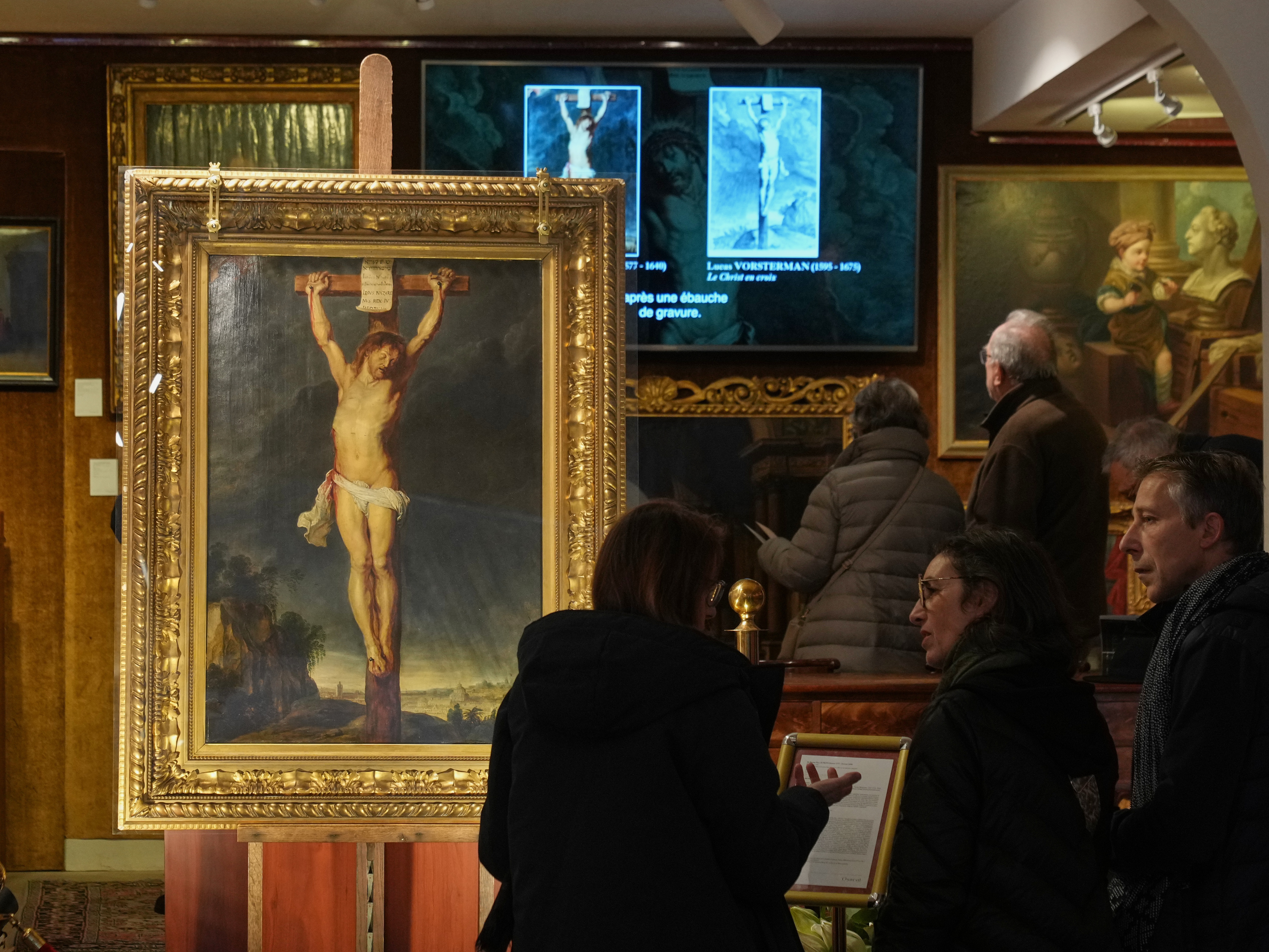 caption: Long-lost painting "Crucifixion of Jesus Christ" by Baroque master Peter Paul Rubens, which was hidden for more than four centuries, is displayed at the auction house Osenat in Versailles, west of Paris, Nov. 30, 2025.