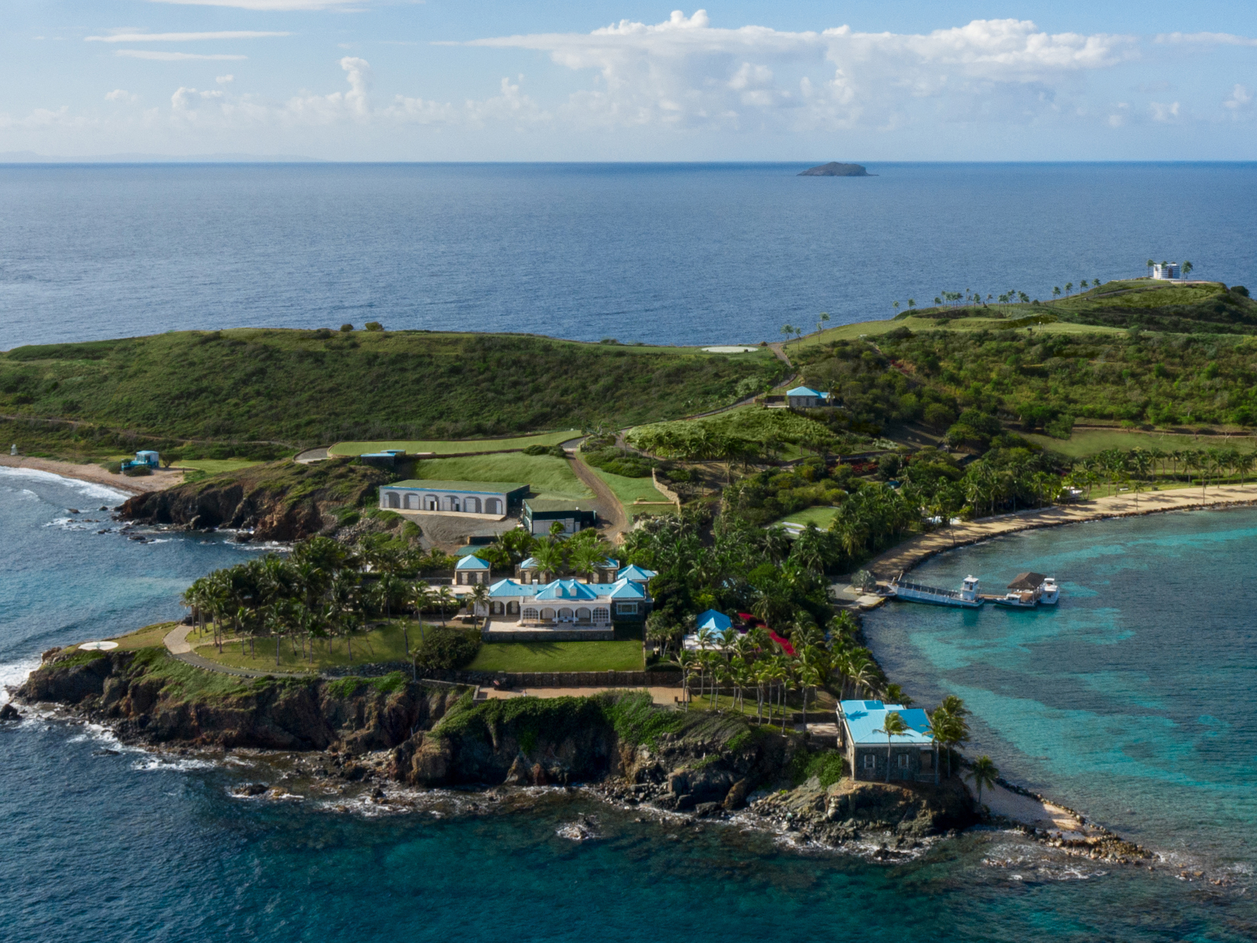 caption: Little Saint James, an island previously owned by the disgraced financier Jeffrey Epstein, has been sold. The 71.6-acre property, seen here in an aerial view, includes a main compound and four guest villas.